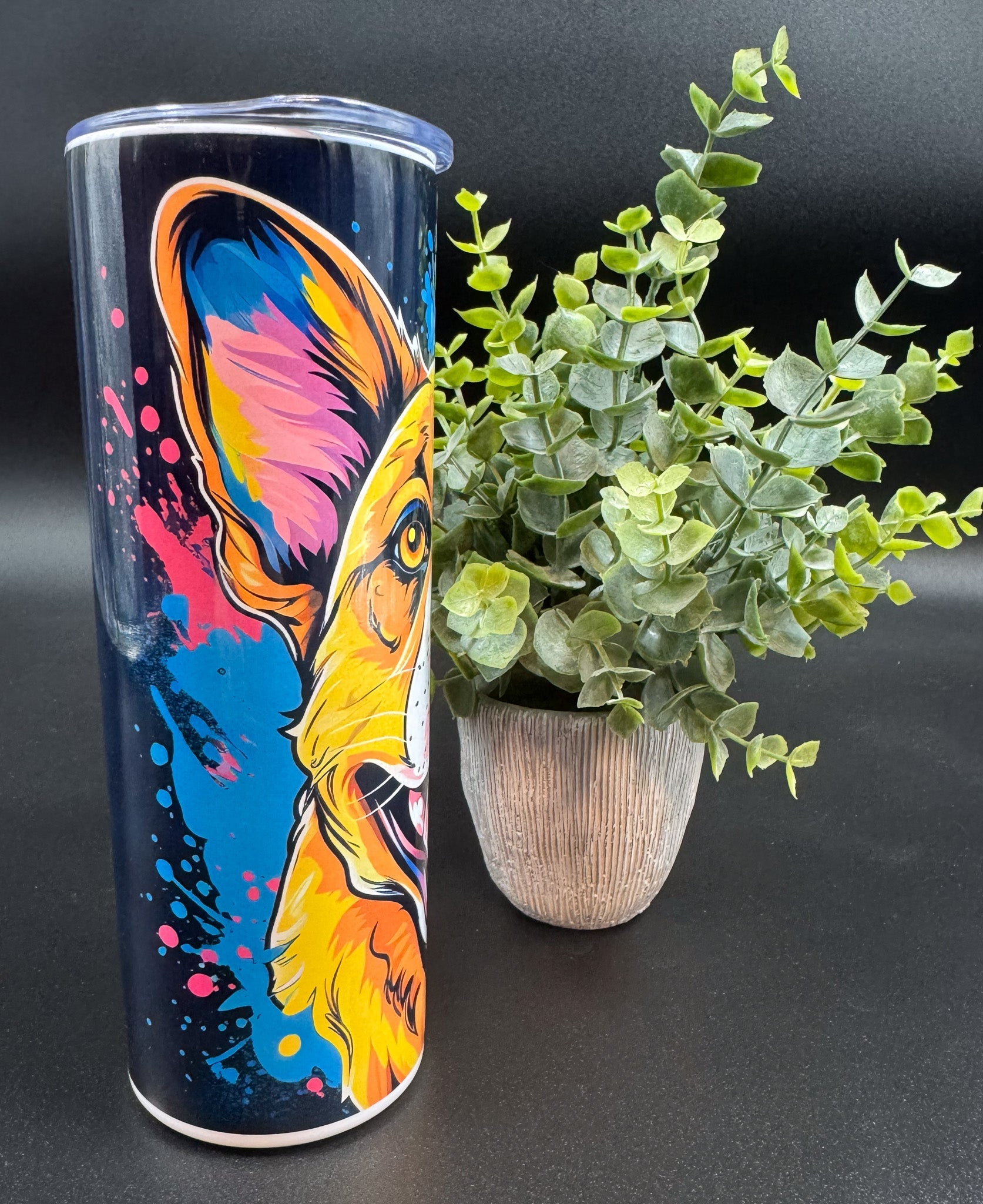 Bouteille isotherme avec visage de chien brun et bleu sur fond de splash de peinture Boutique Poilue & Co.